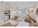 Bedroom with twin-sized bed, closet and ceiling fan at 2969 Talon Dr, Clearwater, FL 33761