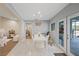 Bright dining area with a table, seating, and patio access at 2969 Talon Dr, Clearwater, FL 33761
