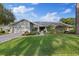 Landscaped home with a well-manicured lawn and inviting curb appeal at 2969 Talon Dr, Clearwater, FL 33761