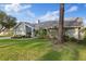 Charming home featuring a well-maintained lawn and inviting landscaping at 2969 Talon Dr, Clearwater, FL 33761