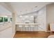 Kitchen boasts an island with bar stool seating and stainless steel appliances at 2969 Talon Dr, Clearwater, FL 33761