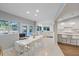 Bright kitchen and dining area with access to outdoor pool area at 2969 Talon Dr, Clearwater, FL 33761