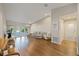 Spacious living room featuring hardwood floors, neutral paint and lots of natural light at 2969 Talon Dr, Clearwater, FL 33761