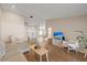 Open-concept living room boasts hardwood floors, neutral tones, and a clear view into other living spaces at 2969 Talon Dr, Clearwater, FL 33761