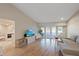 Open-concept living room boasts hardwood floors, neutral tones, and a clear view into other living spaces at 2969 Talon Dr, Clearwater, FL 33761