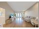 Open-concept living room boasts hardwood floors, neutral tones, and a clear view into other living spaces at 2969 Talon Dr, Clearwater, FL 33761