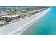 Aerial view of beachfront property with gulf views, white sand beaches, and blue water at 3210 Gulf Blvd # 108, Belleair Beach, FL 33786
