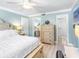 This bedroom offers ample closet space and has an ensuite bathroom with a shower at 3210 Gulf Blvd # 108, Belleair Beach, FL 33786