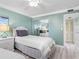 Shared bedroom with two beds, closet, and ensuite bathroom at 3210 Gulf Blvd # 108, Belleair Beach, FL 33786