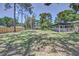 Expansive backyard with a screened-in patio, ideal for entertaining guests at 3225 Bea Ct, Land O Lakes, FL 34639