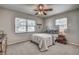 Bedroom with natural light, a baseball-themed decor, and neutral color tones at 3225 Bea Ct, Land O Lakes, FL 34639
