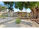 Charming home features a gray exterior, yellow shutters, and a landscaped yard at 3228 7Th N Ave, St Petersburg, FL 33713