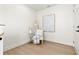 Cozy sitting area with neutral decor, accent table and an art piece at 3228 7Th N Ave, St Petersburg, FL 33713