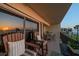 Inviting balcony with comfortable seating, showcases ocean views and offers a tranquil retreat, ideal for enjoying the coastal breeze at 3500 Gulf Blvd # 314, Belleair Beach, FL 33786