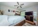 Cozy bedroom featuring ceiling fan and closet, offering a relaxing retreat at 36750 Us 19 N # 5-111, Palm Harbor, FL 34684