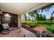 Tranquil outdoor space with brick flooring and serene views of the lush surroundings at 36750 Us 19 N # 5-111, Palm Harbor, FL 34684