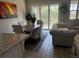 Dining area with natural light, table, chairs, and view through the patio door at 4053 Rocky Shores Dr, Tampa, FL 33634