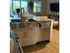 The kitchen features a large sink and modern stainless steel appliances at 4053 Rocky Shores Dr, Tampa, FL 33634