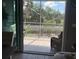 This screened-in patio offers outdoor seating and relaxing views at 4053 Rocky Shores Dr, Tampa, FL 33634
