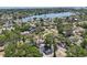 This is an aerial view of the neighborhood, with tree-lined streets and the lake at 419 40Th S Ave, St Petersburg, FL 33705