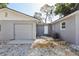 Backyard features a detached garage and gravel landscaping at 419 40Th S Ave, St Petersburg, FL 33705