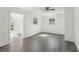 Spacious room with hard wood floors and natural light beaming through the windows at 419 40Th S Ave, St Petersburg, FL 33705