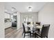 Open dining area adjacent to the kitchen with sliding glass doors leading to the backyard at 4416 W Minnehaha St, Tampa, FL 33614