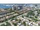 Aerial view showcasing the neighborhood homes, landscape and nearby roadways at 4732 W Wyoming Ave, Tampa, FL 33616