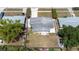 Aerial view of home featuring a fenced in yard and surrounding landscape at 4732 W Wyoming Ave, Tampa, FL 33616