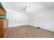 Bonus room features tile floors and is adjacent to the kitchen and dining area at 4732 W Wyoming Ave, Tampa, FL 33616