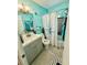 This bathroom is complete with unique blue walls, modern fixtures, and a stylish shower curtain at 5045 2Nd S Ave, St Petersburg, FL 33707