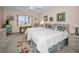 Welcoming bedroom with two beds, water view, and nautical-themed decor at 5108 Brittany S Dr # 607, St Petersburg, FL 33715