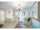 Cozy dining area with a glass table, stylish chairs, and a decorative mirror at 5108 Brittany S Dr # 607, St Petersburg, FL 33715