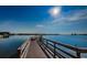 A beautiful wooden dock leading out to the water on a bright, sunny day at 5108 Brittany S Dr # 607, St Petersburg, FL 33715