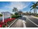 Inviting community entrance with manicured landscaping, signage and security checkpoint at 5108 Brittany S Dr # 607, St Petersburg, FL 33715