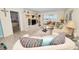 Cozy living room with water views, comfortable seating, and a decorative entertainment center at 5108 Brittany S Dr # 607, St Petersburg, FL 33715