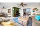 Spacious living area with sliding doors to the sunroom and views of the water at 5108 Brittany S Dr # 607, St Petersburg, FL 33715