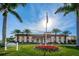 Exterior of the Residents Club with manicured lawn and tropical landscaping at 5108 Brittany S Dr # 607, St Petersburg, FL 33715