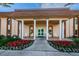 The entrance to the Residents Club features tropical landscaping and outdoor seating at 5108 Brittany S Dr # 607, St Petersburg, FL 33715