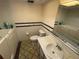 Functional bathroom with tile accents, sink, toilet, and walk-in tub at 5720 13Th N Ave # 106B, St Petersburg, FL 33710