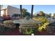 Tampa Racquet Club condominium sign surrounded by lush greenery and landscaping at 5820 N Church Ave # 212, Tampa, FL 33614