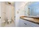 Full bathroom with tile flooring, shower/tub combo, and vanity with granite countertop at 70 Ashley Ln, Oldsmar, FL 34677