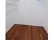 Spacious walk-in closet with wire shelving and wood flooring at 70 Ashley Ln, Oldsmar, FL 34677