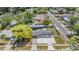 Picture of the lovely home highlighting the property layout with a detached garage, convenient parking, and landscaping at 7201 N Grady Ave, Tampa, FL 33614