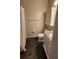 Compact bathroom showcasing a granite vanity and shower at 7530 Red Mill Cir, New Port Richey, FL 34653