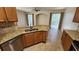 Kitchen with stainless appliances, granite countertops, and breakfast bar at 7530 Red Mill Cir, New Port Richey, FL 34653