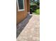 Paver patio located on the side of the building provides tranquil outdoor space at 7530 Red Mill Cir, New Port Richey, FL 34653