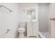 This bathroom offers a sleek vanity, tile shower, and modern fixtures at 8008 N Alaska St, Tampa, FL 33604