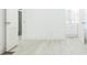Open bedroom layout with views to the bath and adjoining room at 8008 N Alaska St, Tampa, FL 33604
