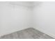 Simple closet space features new laminate floors and wire shelving unit at 8008 N Alaska St, Tampa, FL 33604